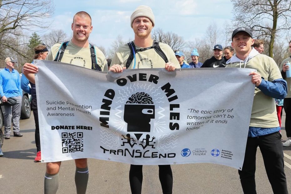 Mind Over Miles athletes with sign